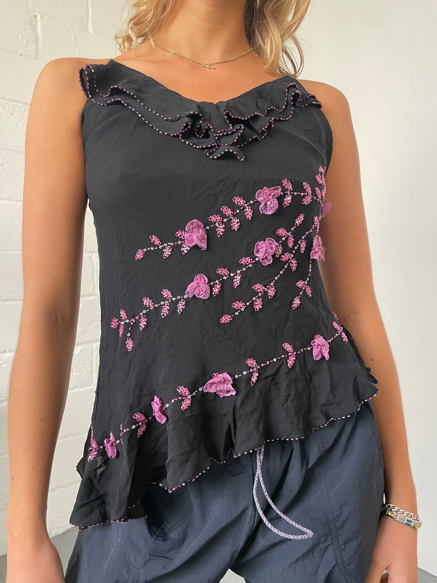 Black Asymmetric Blouse with Purple Beaded Flowers