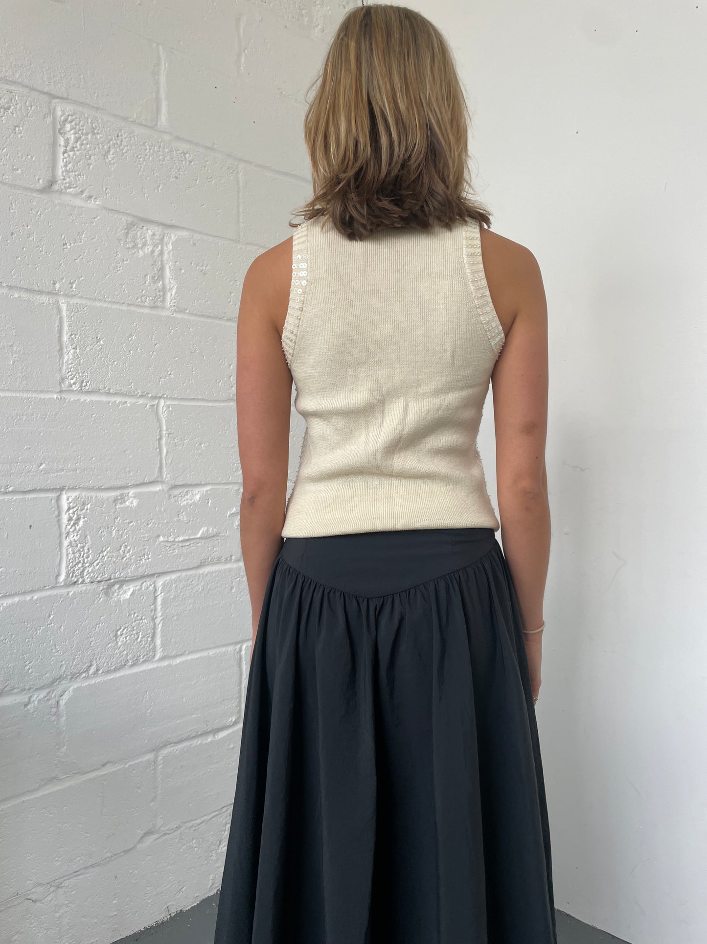 Cream Sleeveless Turtleneck Knit